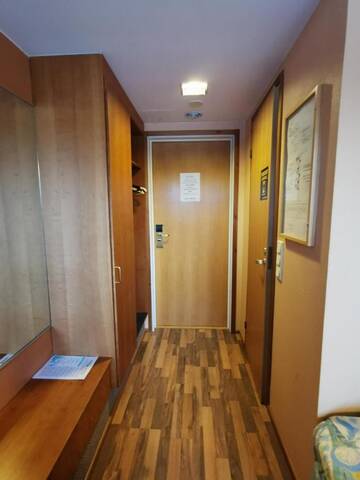 Фото номера Двухместный номер с 2 отдельными кроватями Отель Hotelli Iisoppi г. Нокиа 5